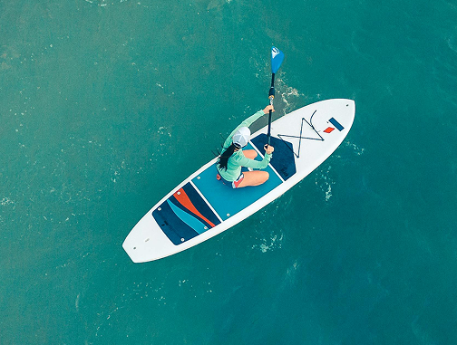 overhead view of a person in a kayak on the water